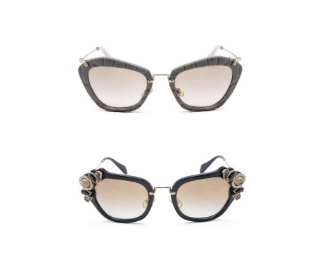 TWO PAIRS OF MIU MIU CAT EYE SUNGLASSES
Comprising:
Model SMU 10N, with grey crocodile-effect textured frame, with silver-ton