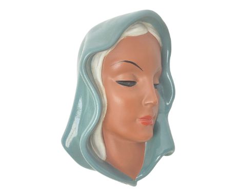 Art Deco Goldscheider terracotta face wall plaque, modelled as a woman in a headscarf, H20cm