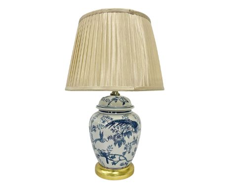 Table lamp of baluster form, decorated with exotic birds up fruiting trees, on gilt chrome pedestal, including shade H554cm