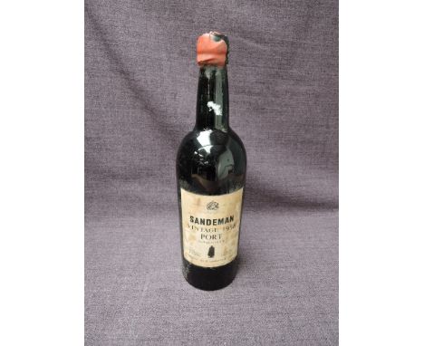 A bottle of Sandeman Vintage 1958 Port, bottled in 1960, full size bottle, no strength or capacity stated, wax seal partly mi