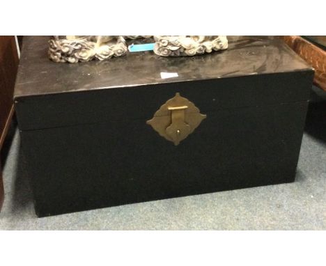 A brass lacquer trunk.
