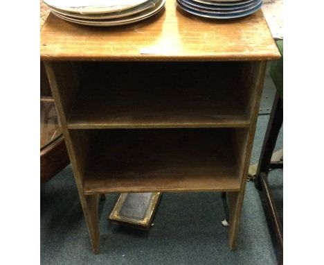 A stripped pine wall shelf.