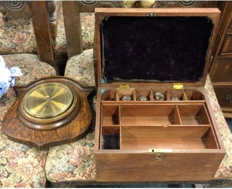 An old barometer together with a travelling medical set.