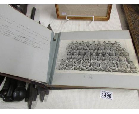 A WW2 military photograph album containing approximately 90 black and white photographs of members of the 36th Infantry divis