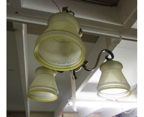 A retro ceiling light with shades.