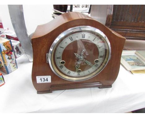 An 8 day mantel clock.