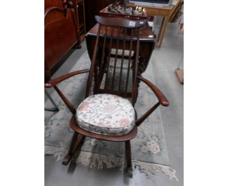 An Ercol rocking chair,.