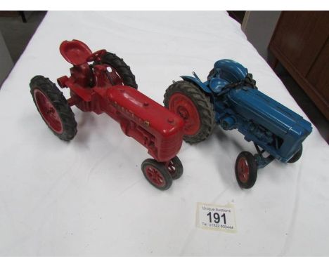 A Chad Valley Fordson tractor and one other.