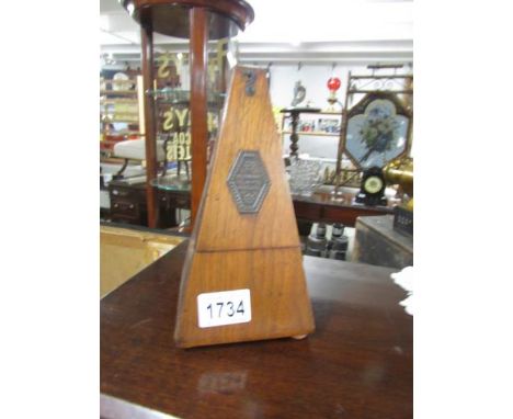An old metronome, in working order.