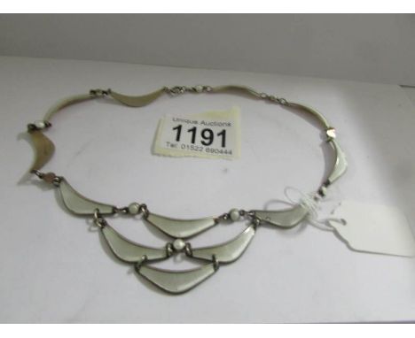 A Scandinavian white enamel 3 tiered necklace, circa 1970's in silve, stamped on back ' A Sch, 9255'