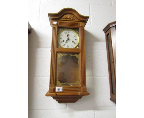 A modern wall  clock.