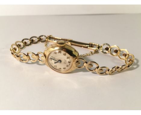 A 9ct gold Rotary watch and bracelet, 12.44 grams.
