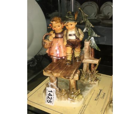 A boxed Hummel Goebel figure group 'On Our Way'.