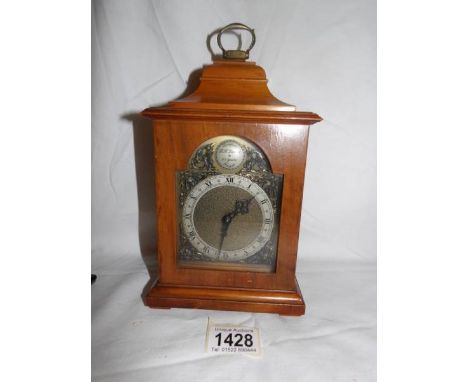 A small contemporary bracket clock (wound to maximum).