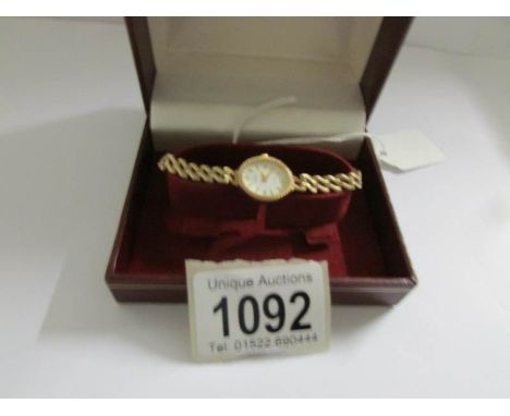 A ladies 9ct gold Rotary wrist watch on 9ct gold bracelet.