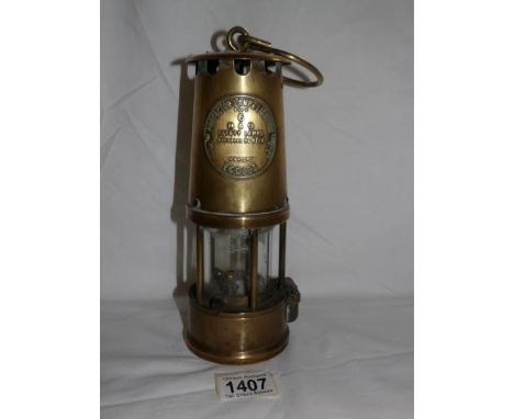 A brass Eccles type 6 miner's lamp.
