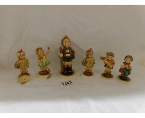 6 boxed Hummel Goeble club figures.