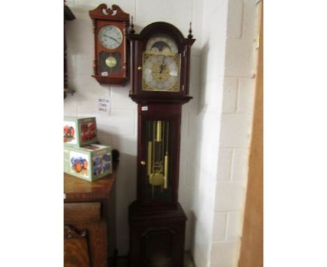 A modern long case clock.