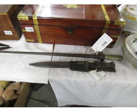 A French model 1886 Leebel 'Rosalie' bayonet with scabbard and a German model 1884/98 second pattern bayonet with scabbard an