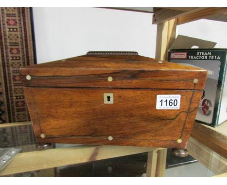 A Victorian rosewood tea caddy,