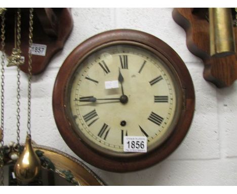 A circular wall clock,