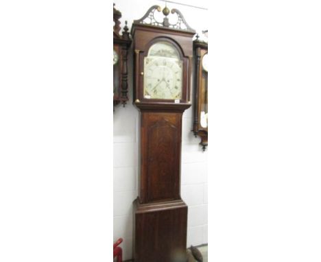 An 8 day painted dial oak long case clock, W. Hellinell, Leeds.