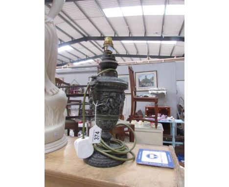 A Roccoco style table lamp base converted to electric.