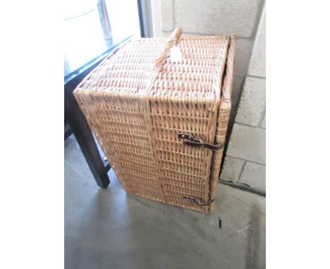 A large wicker trunk.
