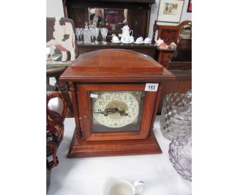An 8 day mantel clock in working order.