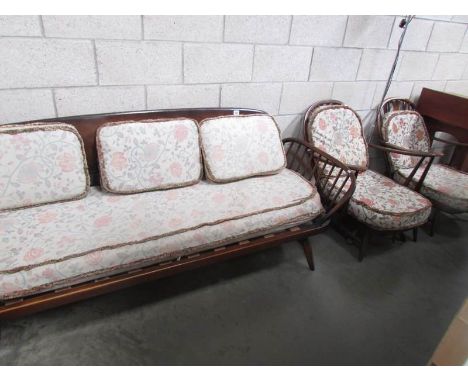 An Ercol three piece suite.