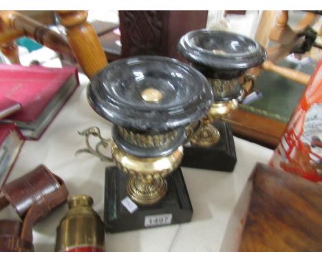 A pair of marble clock side pieces.