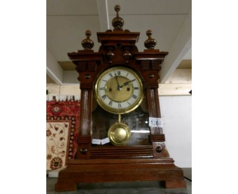A mahogany cased mantel clock.