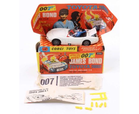Corgi Toys No. 336 James Bond's Toyota 2000 GT comprising of white body with black interior, and two figures, fitted with wir