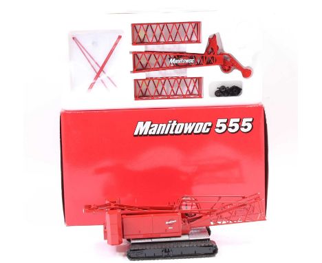 A Classic Construction Models 1/50 scale diecast model of a Manitowoc 555 crawler crane, finished in red with black detailing