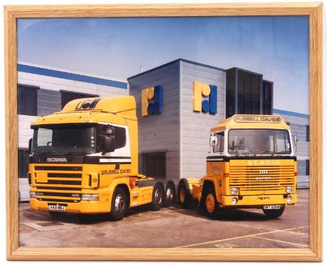 An original framed and glazed photograph of two Russell Davies livery Scania trucks, being the first and last Scania trucks u