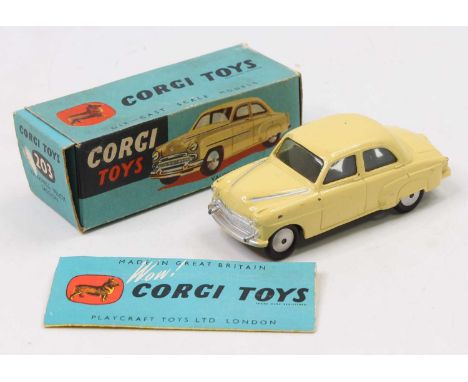 Corgi Toys No. 203 Vauxhall Velox Saloon, yellow body with silver detailing, glazing and spun hubs, in the original blue grou