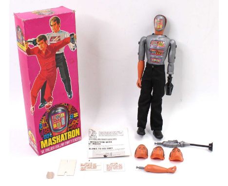 A Denys Fisher Six Million Dollar Man "Maskertron" Steve Austin's enemy action figure with interchangeable accessories and cl