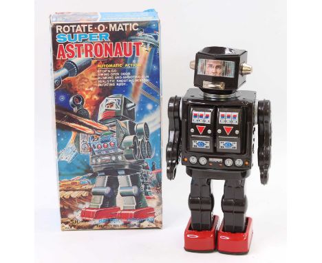 Horikawa Toys Japan tinplate battery operated "Rotate-o-matic" super astronaut with stop and go working action, with swing op