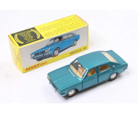 French Dinky Toys, 1409, Chrysler 180, metallic turquoise body, light tan interior, detailed hubs, in the original all card b