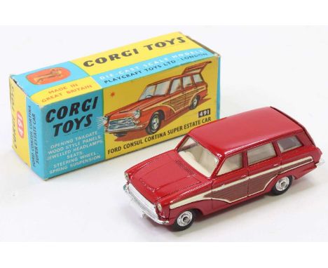 Corgi Toys No. 491 Ford Consul Cortina Super Estate car finished in bright red with brown side panels and a cream interior, h