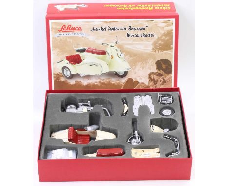 A Schuco The Legend in Toys No. 06541 tinplate Heinkel roller Tourist motorcycle and sidecar, kit version, in the original fo