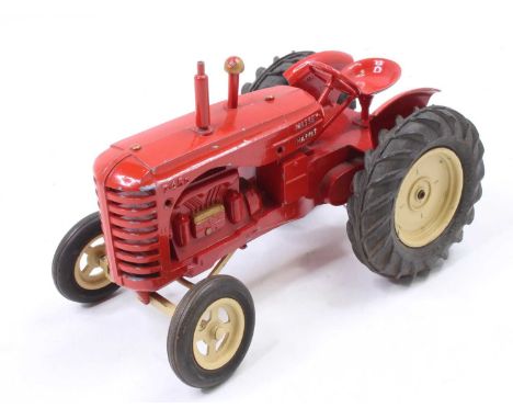 A Moko Lesney No. 745D Massey Harris tractor, comprising of red body with cream hubs, complete with exhaust and chimney (G-VG