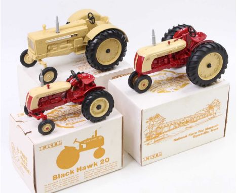An Ertl boxed tractor and agricultural vehicle heavy diecast group, to include a No. 2880 Black Hawk 50 tractor, a No. 2960 C