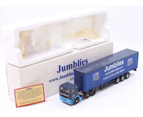 A Corgi Toys 1/50th scale ERF EC 11 tractor unit with curtain side trailer, the model was released to celebrate Jumblies movi