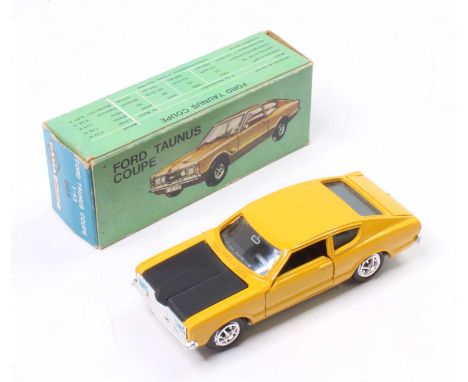 Gama No.995 Ford Taunus Coupe "Jackie Stewart", mustard yellow body, black interior, chrome wheels, in the original card box 
