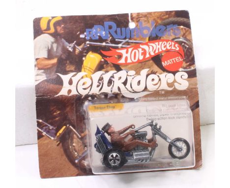 Hotwheels Mattel Rrrumblers Hellriders Series "Torque Chop", housed on the original backing card, brown rider with dark blue 