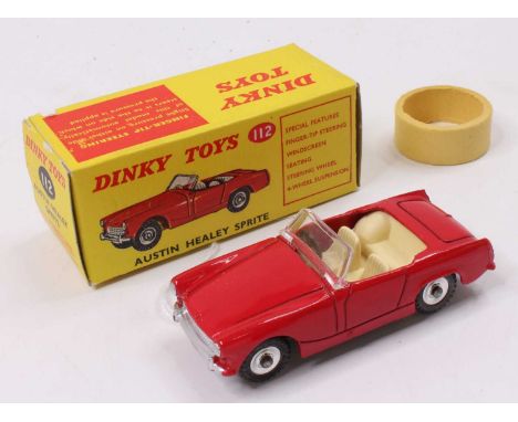 Dinky Toys No. 112 Austin Healey Sprite saloon comprising red body with cream interior and spun hubs housed in the original p