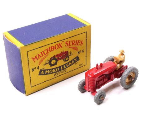 Matchbox Lesney No. 4b Massey Harris Tractor in red with a tan driver figure - a second issue model without mudguards (VGNM-B