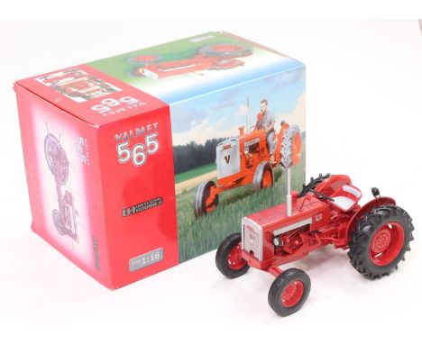 A Universal Hobbies No. 2620 1/16 scale model of a Valmet 565 tractor finished in red and grey housed in the original limited