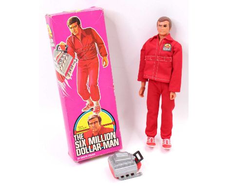 A Denys Fisher Six Million Dollar Man Colonel Steve Austin action figure with original clothing, shoes and plastic engine com